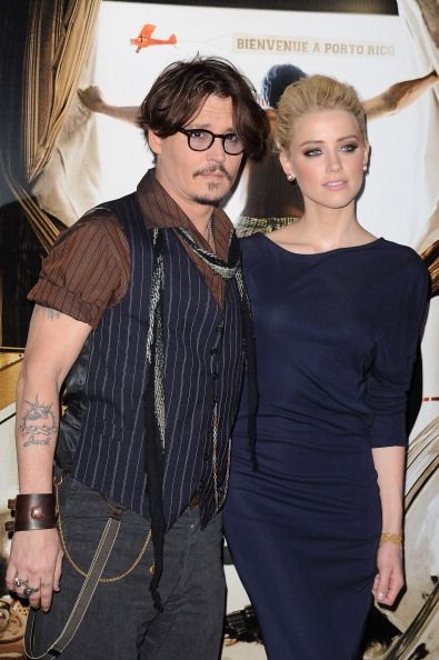 Johnny Depp`s Wife Amber Heard In Trouble Because Of Dogs