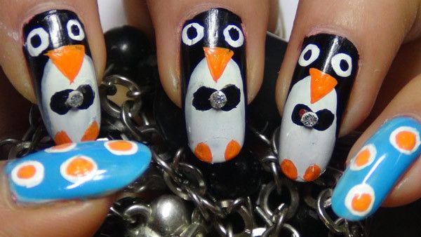 pingüino último arte de uñas