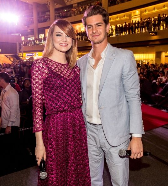Emma Stone y Andrew Garfield en el`Amazing Spider-Man 2` fan event in Singapore.