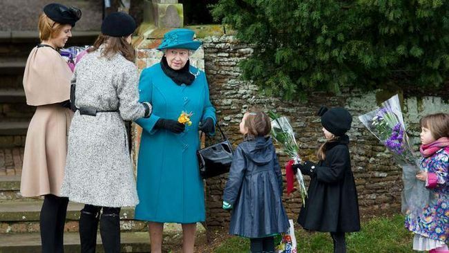 Ariana`s daughter, Amelia, greeting the Queen on Christmas morning. Photo credit: Leon Neal/AFP/Getty Images. Reprinted with permission.
